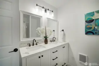 Primary bath features double vanities.