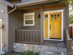 Custom entry door and covered porch