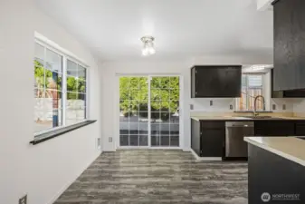 Dining in kitchen with great light!