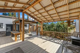 Enjoy backyard living year round with covered deck and water feature. 14'x20' Shop-Whether you’re a hobbyist, woodworker, tinkerer, or just need a little extra room for projects or storage-this space fits the bill.