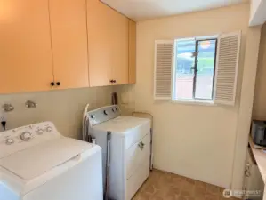 Utility room, access is through 3rd bedroom and into garage