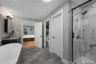 Walk in shower and soaking tub.