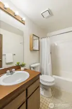 Upstairs hall, shared full bathroom.