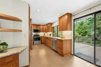 Clean lines and timeless finishes create a kitchen that feels both modern and warm.