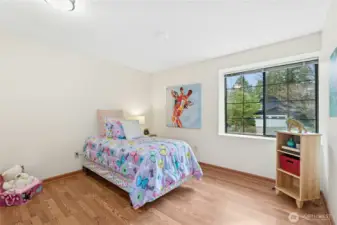 Bright secondary bedroom with comfortable layout.