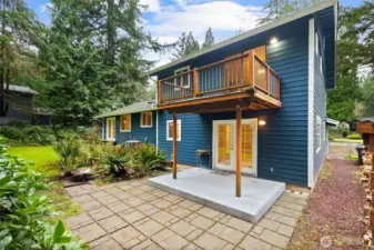 Covered deck and Primary Bedroom Balcony