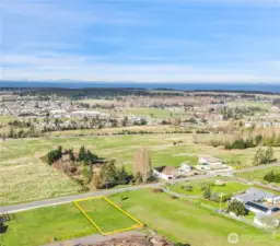 Lot 2 Aerial North-facing view with proximity to the City of Sequim, Strait of Juan de Fuca and Vancouver Island