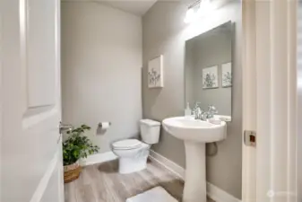 Half bath on the main floor is perfect for guests