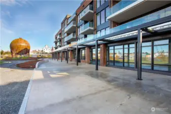 NW corner of Building A. Commercial patio. . Furniture not included in sale.