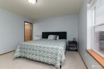 Large primary suite.  Door to left is to primary bath.  Walk in closet behind camera.