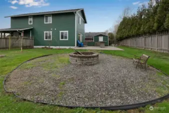 Large back yard with fire pit, outdoor kitchen, water feature and shed.  Plus lots of room for additional flower or vegetable garden