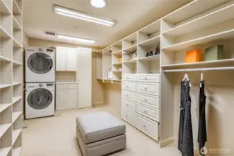 Oversized walk-in closet with private laundry