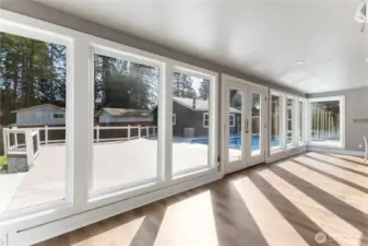 Sunroom backs up to the kitchen bar.