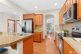 Granite island and eating bar. Stainless appliances. New Kitchen faucet.