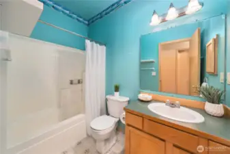 Full bath located in the hall near Bedroom #2 and the office.