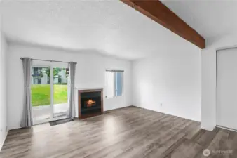 Electric fireplace is ready to turn on at the flip of a switch for heat and ambience.