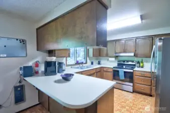 Kitchen that overlooks beautiful territorial views in backyard.