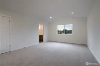 Upstairs primary bedroom - Pics are of a different 3049 plan. Features and colors may differ.