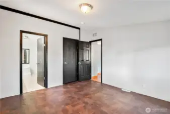 primary suite with walk in closet