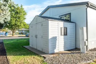 side yard with storage shed