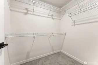 Walk-in primary closet.