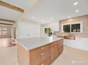 Kitchen.  Double door shown in photo has laundry hookups.