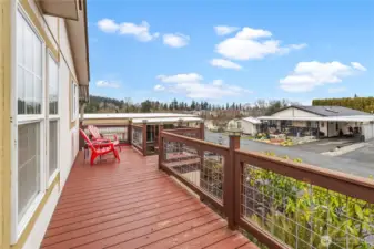 Enjoy your porch with Northwest views and skyline sunsets. Excellent landscaping and curb appeal.