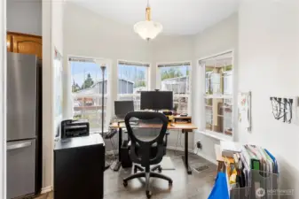Breakfast eating nook or great flex space, currently used as an office to enjoy the outlook and bright windows.