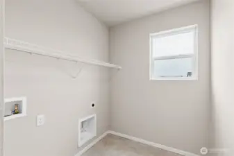 Utility room.  Pictures are for representational purposes only. Materials and colors may vary,