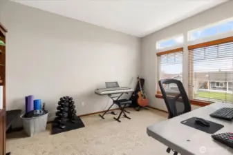 Home office with room for workouts.