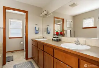 Enjoy the double vanity with ample storage cabinets.