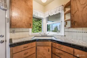 Nice corner sink with windows.