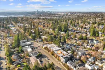 Aerial photo looking south. From this photo you can see Lake Washington, Husky Stadium and downtown Seattle. Sought after Wedgwood neighborhood 86 walk score & 81 bike score. Walking distance to grocery stores, cafes, and only minutes to Children's, UW, 520, downtown & Amazon! Located in #1 sought after school cluster!