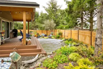 Covered deck with plumbed propane for BBQ.