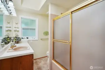Full bath located by 3 bedrooms