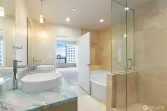 Soaking tub + large walk-in shower.