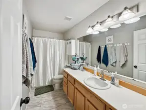 Upstairs guest bath with plenty of room for a large family.
