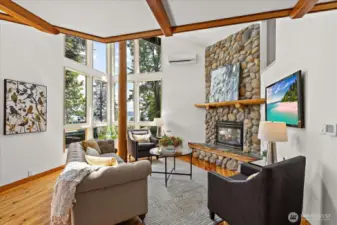 Wonderful natural light floods into the house. Antique Petrified wood was used throughout the home. Enjoy lake & Mt. Rainier views.