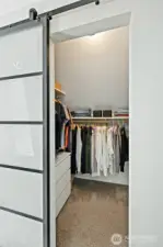 Primary walk-in closet.
