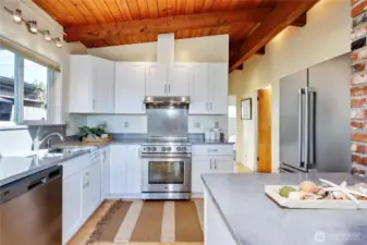 The kitchen is outfittied with new Beko stainless steel appliances.