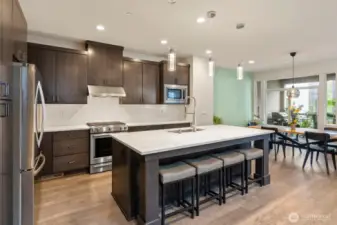 An inviting eat-in kitchen with a spacious dining area, seamlessly blending functionality and comfort for casual meals and gatherings.