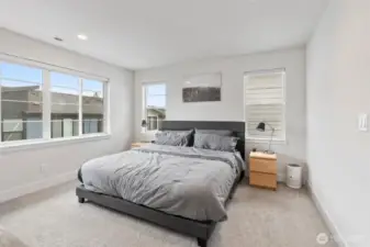 Unwind in the generous primary suite with ample closet space and a spa-like en-suite.