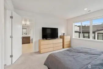 Experience comfort and serenity in your spacious bedroom.