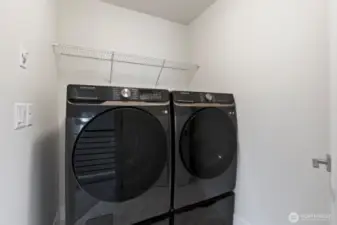 Say goodbye to clutter and hello to a functional and tidy laundry space conveniently located between all bedrooms.