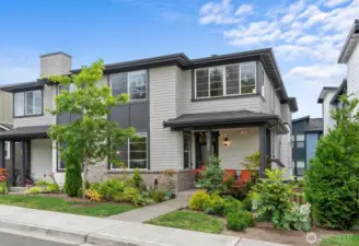 Step outside to a beautifully landscaped front yard.