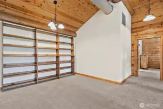 This beautiful loft awaits when you reach the second story landing. Primary to the right.