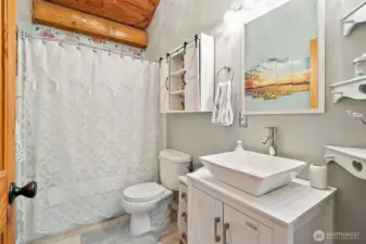 Main bath for the 2nd story, next to 2 bedrooms and bonus room.