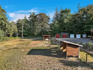 2 loafing sheds. 2 outbuildings, 1 tack room with power. Arena.