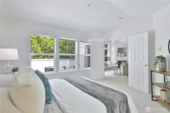 French doors open to the primary bedroom
