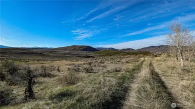 Peace and quiet looking north. Even in late winter, the view from this property is unmatched. Come see how free you could be as the seasons change in the Okanogan Valley.